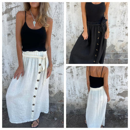 Egyszínű szoknya gombokkal és megkötős övvel