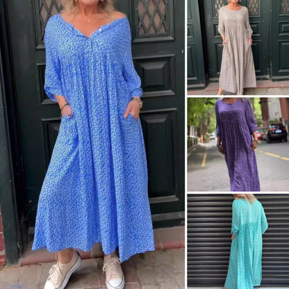 Női ruha gombos rögzítéssel, 3/4-es ujjakkal és pöttyös mintával